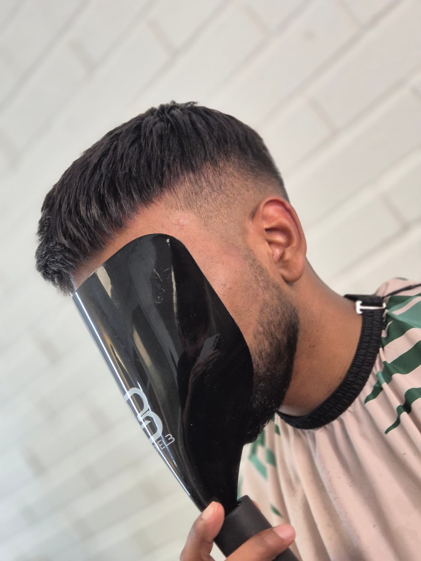 Short textured hair system with tight fade