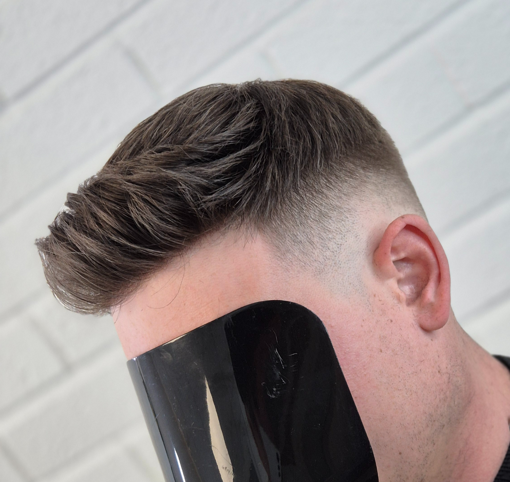 Textured quiff hair system with skin fade
